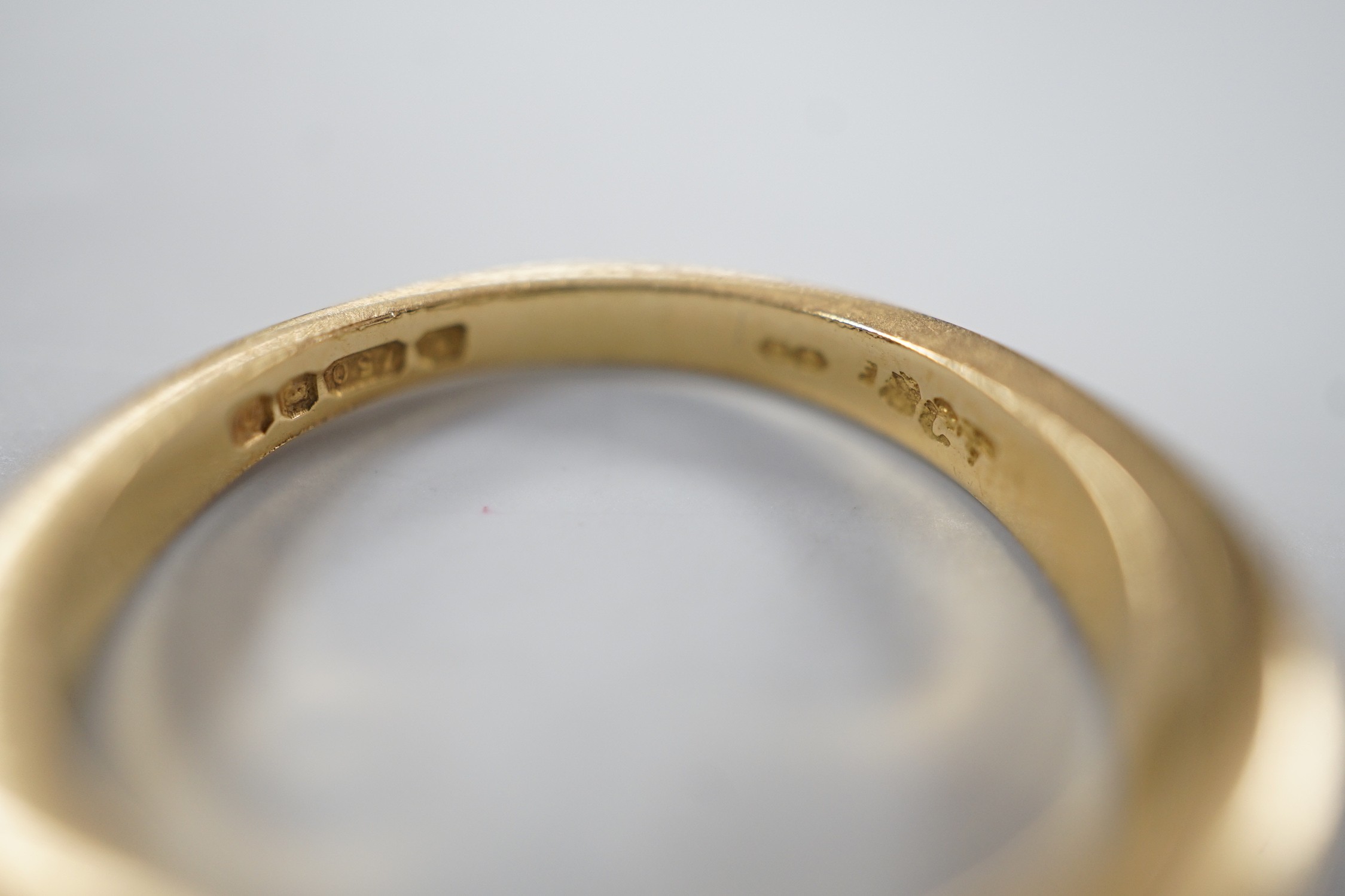 A modern 18ct gold and seven stone diamond set half hoop ring, size P, gross weight 5.3 grams.